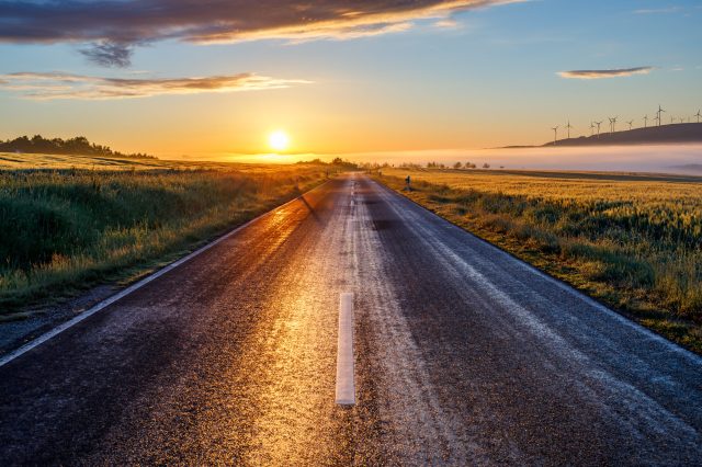 A beautiful view of a road at sunrise in the early morning